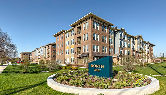 An exterior photograph of North 680, a 180-unit luxury rental property in Schaumburg, Illinois.