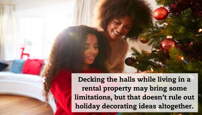 A mother and daughter decorate a Christmas tree. A caption reads: "Decking the halls while living in a rental property may bring some limitations, but that doesn’t rule out holiday decorating ideas altogether."