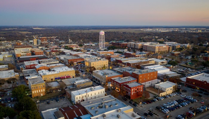 An aerial view of McKinney, Texas at near dusk.