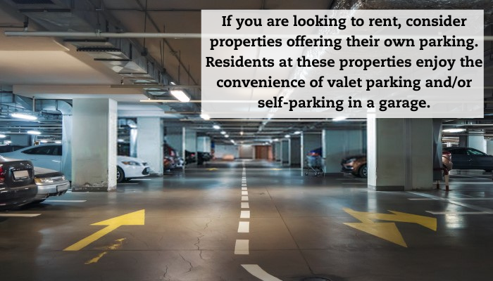 Looking down the driving lane of an indoor parking garage. A caption reads: "If you are looking to rent, consider properties offering their own parking. Residents at these properties enjoy the convenience of valet parking and/or self-parking in a garage."