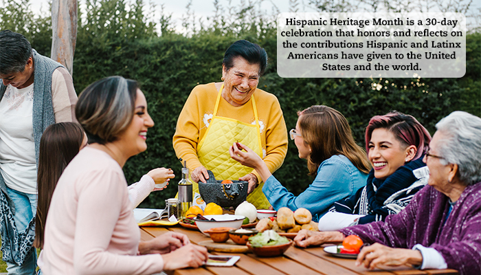 A family enjoys a meal on a picnic bench. A quote reads, "Hispanic Heritage Month is a 30-day celebration that honors and reflects on the contributions Hispanic and Latinx Americans have given to the United States and the world."