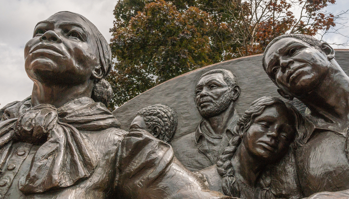 A close-up of a monument honoring African American history.