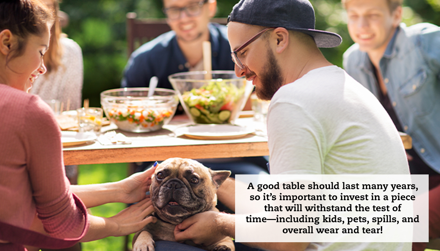 A couple pets their dog that is climbing up from under a picnic table. A quote reads, "A good table should last many years, so it’s important to invest in a piece that will withstand the test of time—including kids, pets, spills, and overall wear and tear!"