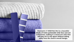 A stack of fabrics with a Pantone Very Peri swatch in front. The fabric is near the Very Peri color. The top one is white. A quote reads: "Pantone’s 17-3938 Veri Peri is a beautiful shade of violet periwinkle with blue and red undertones, making it a stand-out color that will pop out in any space without taking away from the room’s overall design."