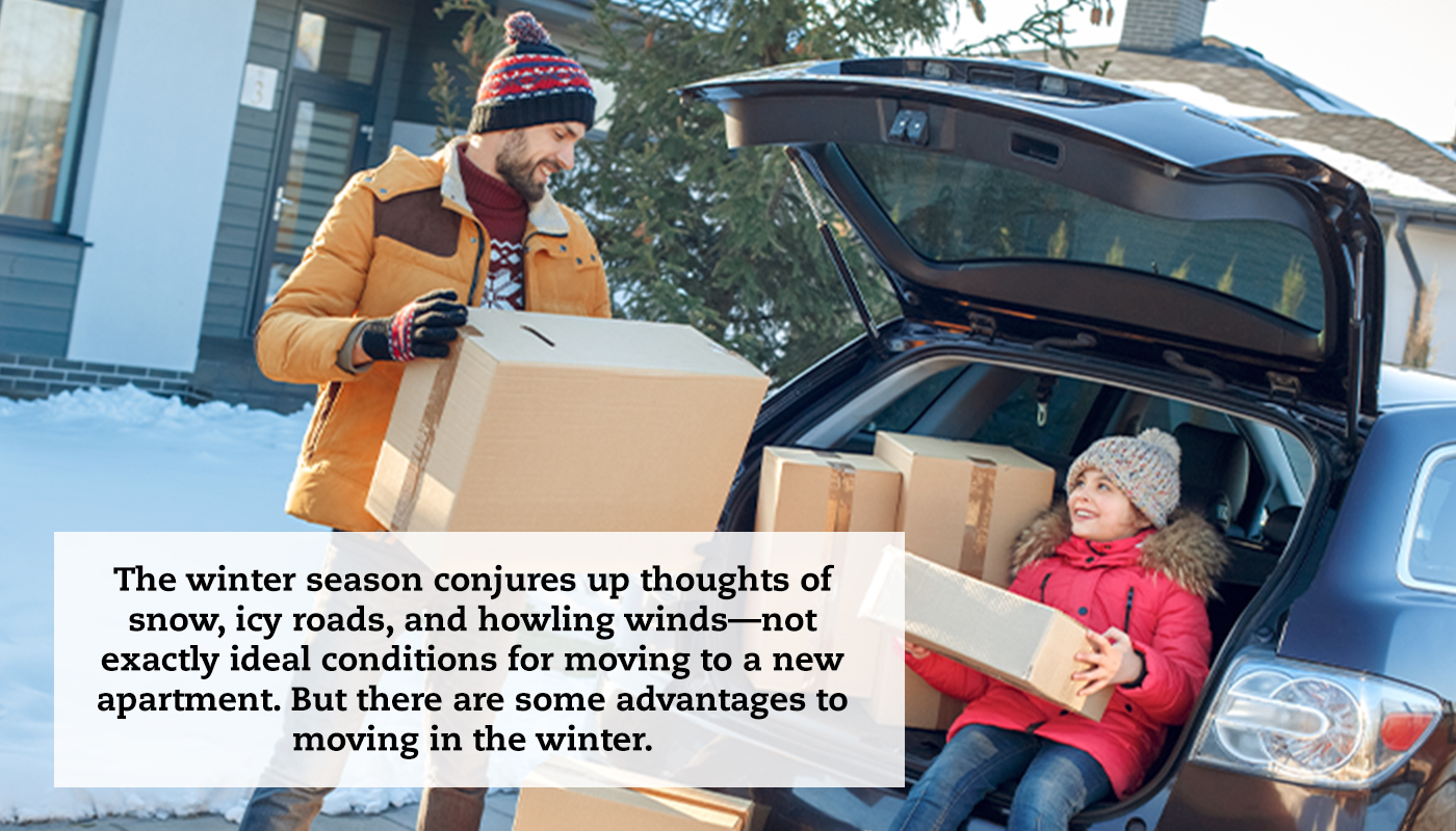 A man loads boxes into the back of his car. His daughter is sitting in the hatchback holding a box smiling at him. A quote reads: "The winter season conjures up thoughts of snow, icy roads, and howling winds—not exactly ideal conditions for moving to a new apartment. But there are some advantages to moving in the winter."