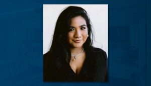 A woman with long black hair.