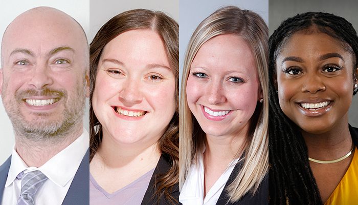 Four smiling professionals posing for headshot portraits.